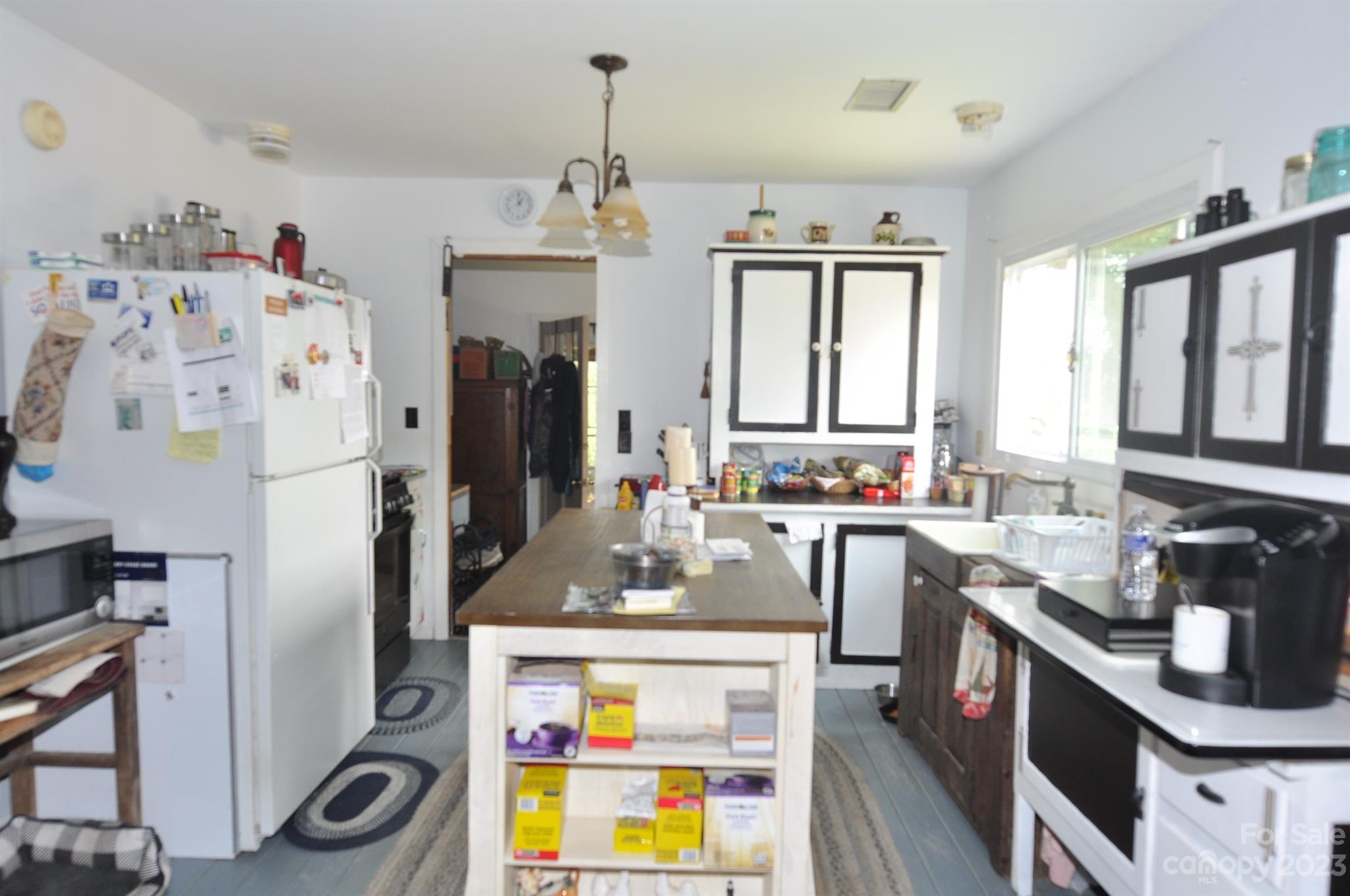 2546 Trussel Road Chester, SC 29706 - Photo 6 of 25 a kitchen with refrigerator a stove and a sink