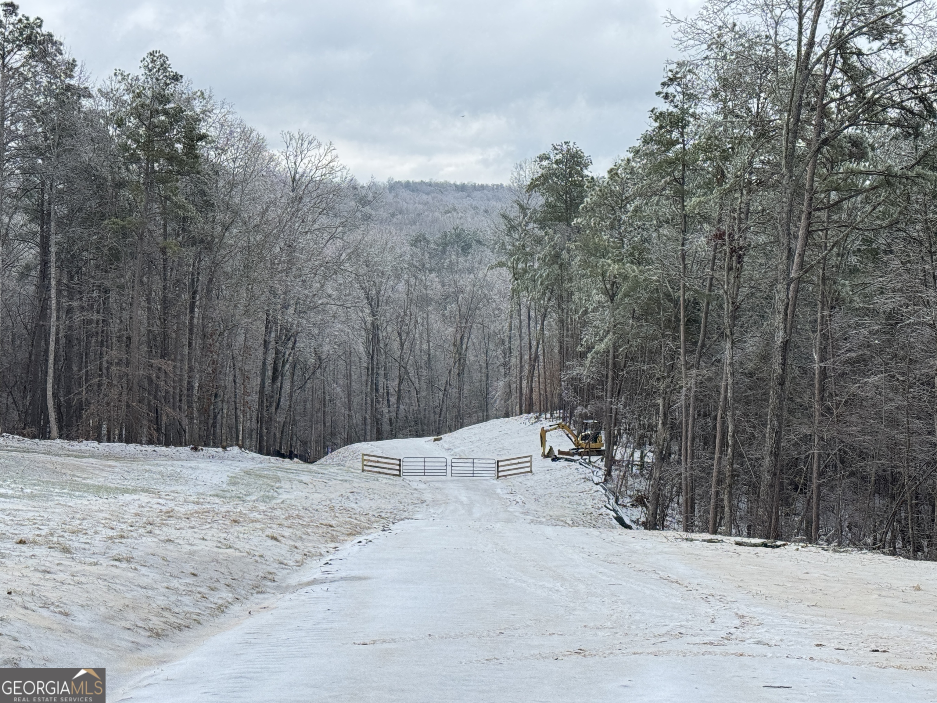 a view of a backyard of the house