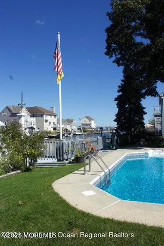 a view of a house with swimming pool