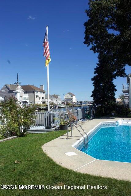 22 Queen Ann Road Brick, NJ 08723 - Photo 13 of 22 a view of a house with swimming pool