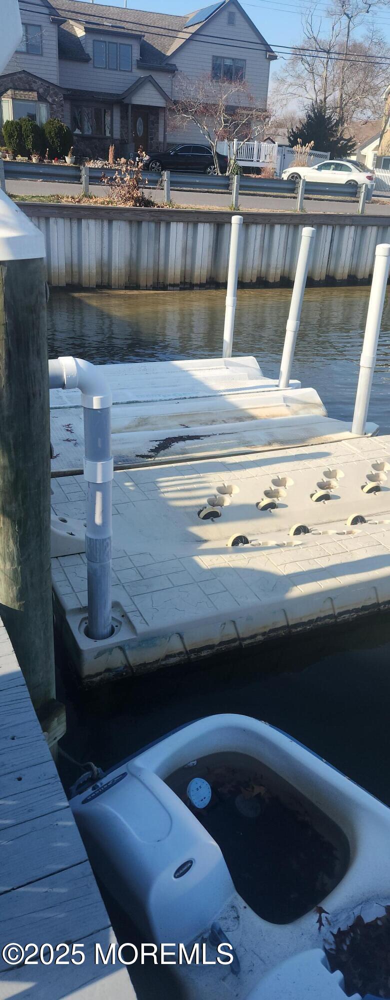 22 Queen Ann Road Brick, NJ 08723 - Photo 17 of 22 a view of water heater and wooden floor
