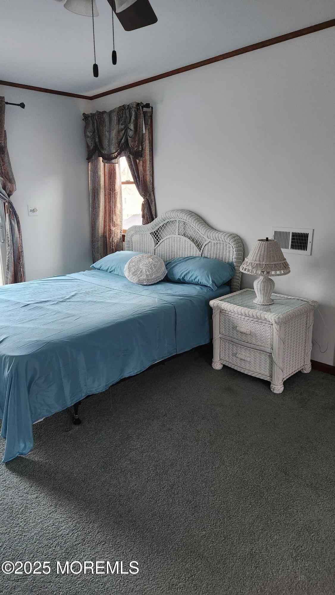 22 Queen Ann Road Brick, NJ 08723 - Photo 19 of 22 a bedroom with bed and window