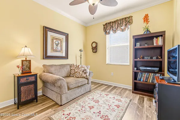 a view of street with wooden fence