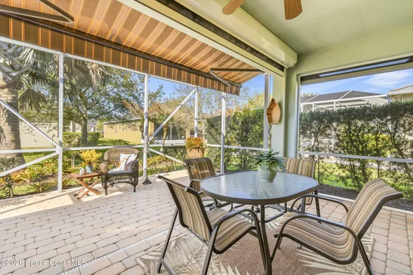 an aerial view of residential house with outdoor space and swimming pool