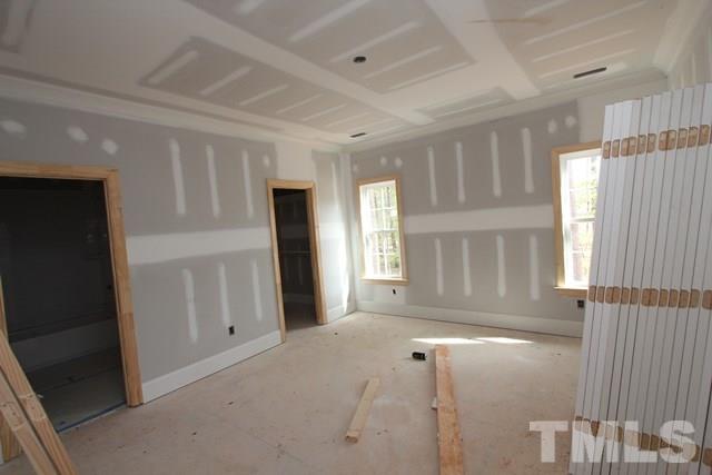 8620 Wapello Lane Raleigh, NC 27613 - Photo 13 of 25 a view of an empty room with a window