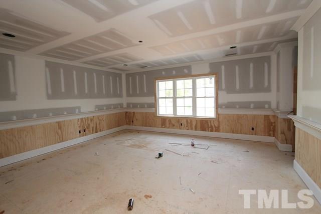 8620 Wapello Lane Raleigh, NC 27613 - Photo 16 of 25 a view of an empty room with a window
