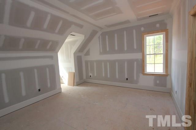 8620 Wapello Lane Raleigh, NC 27613 - Photo 17 of 25 an empty room with windows