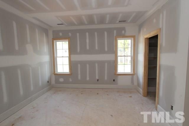 8620 Wapello Lane Raleigh, NC 27613 - Photo 20 of 25 an empty room with windows