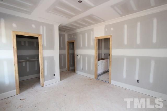 8620 Wapello Lane Raleigh, NC 27613 - Photo 21 of 25 wooden floor and closet in a room
