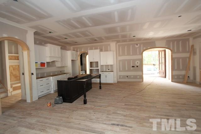 8620 Wapello Lane Raleigh, NC 27613 - Photo 5 of 25 a living room with furniture and a wooden floor