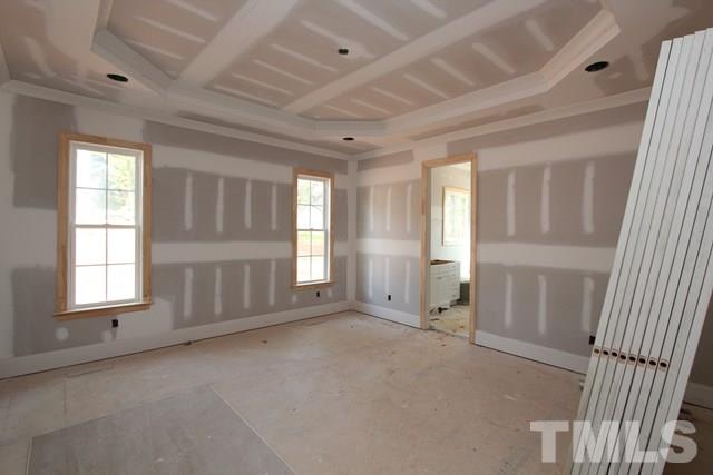 8620 Wapello Lane Raleigh, NC 27613 - Photo 6 of 25 an empty room with windows