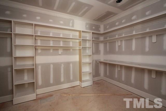 8620 Wapello Lane Raleigh, NC 27613 - Photo 10 of 25 a view of an empty room with a white walls