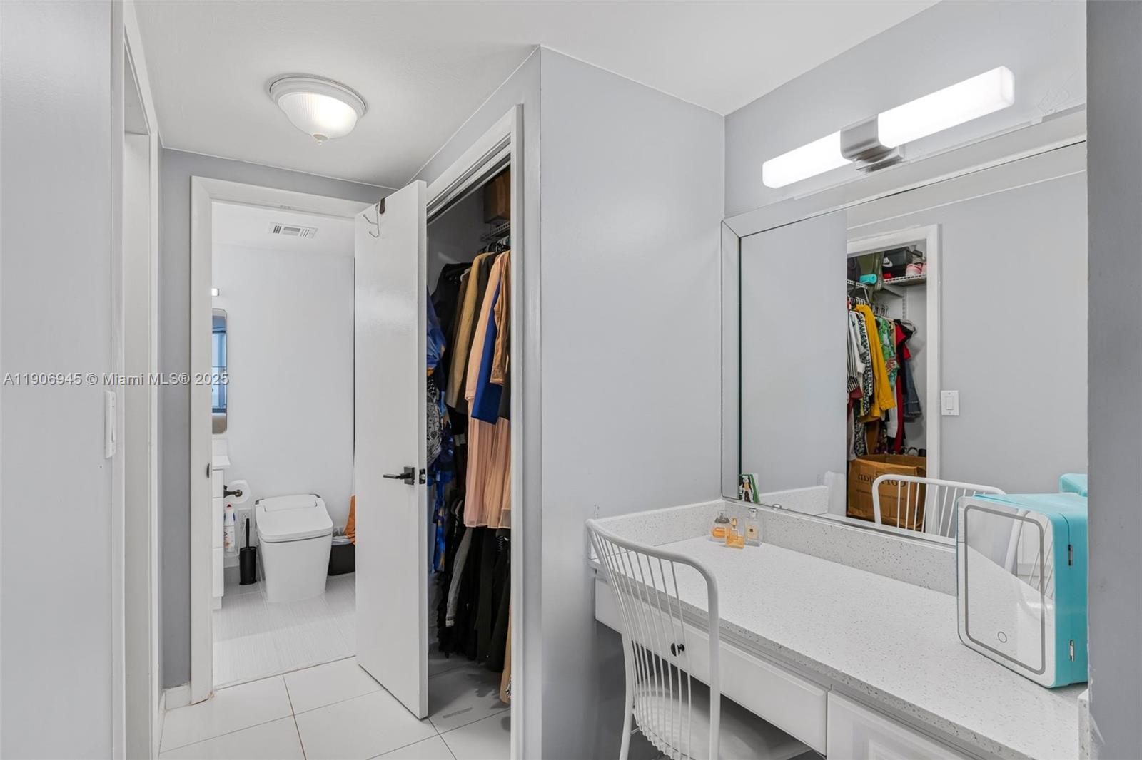 4400 Hillcrest Drive, Unit 912B Hollywood, FL 33021 - Photo 19 of 34 a bathroom with a sink and a mirror