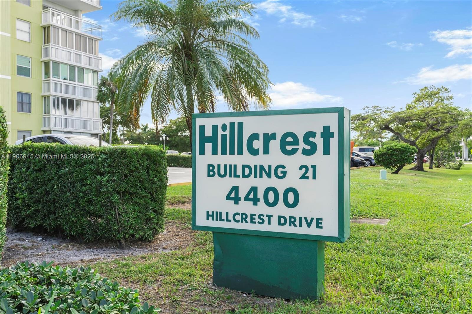 4400 Hillcrest Drive, Unit 912B Hollywood, FL 33021 - Photo 32 of 34 a sign broad in front of a brick building