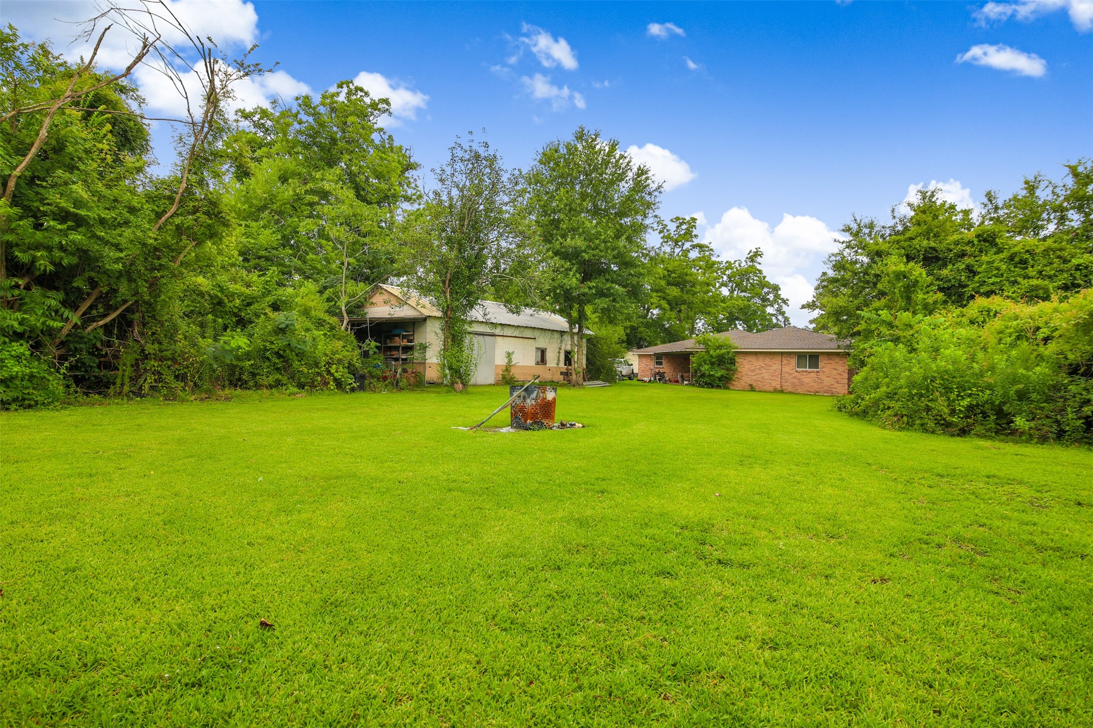 8406 East Mt Houston Road Houston, TX 77050 - Photo 26 of 30 a green field with lots of trees in it