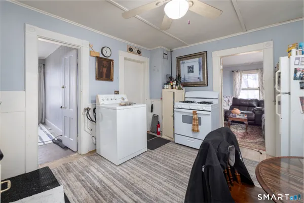 a view of a living room and dining room