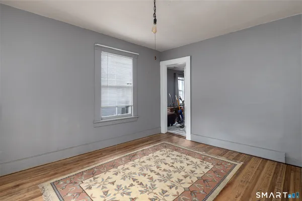 a view of an empty room and window