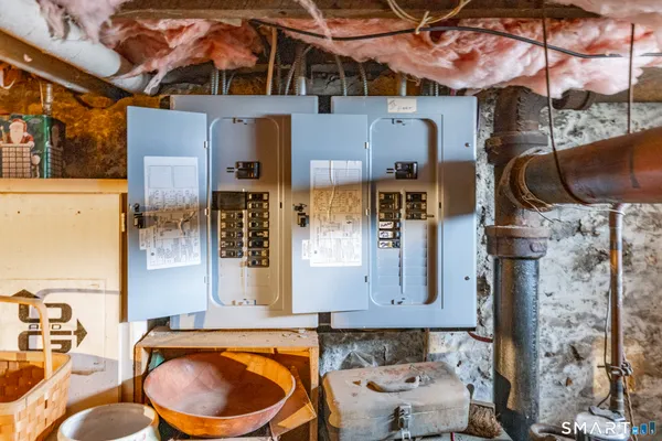 a bathroom with a sink mirror toilet and bathtub