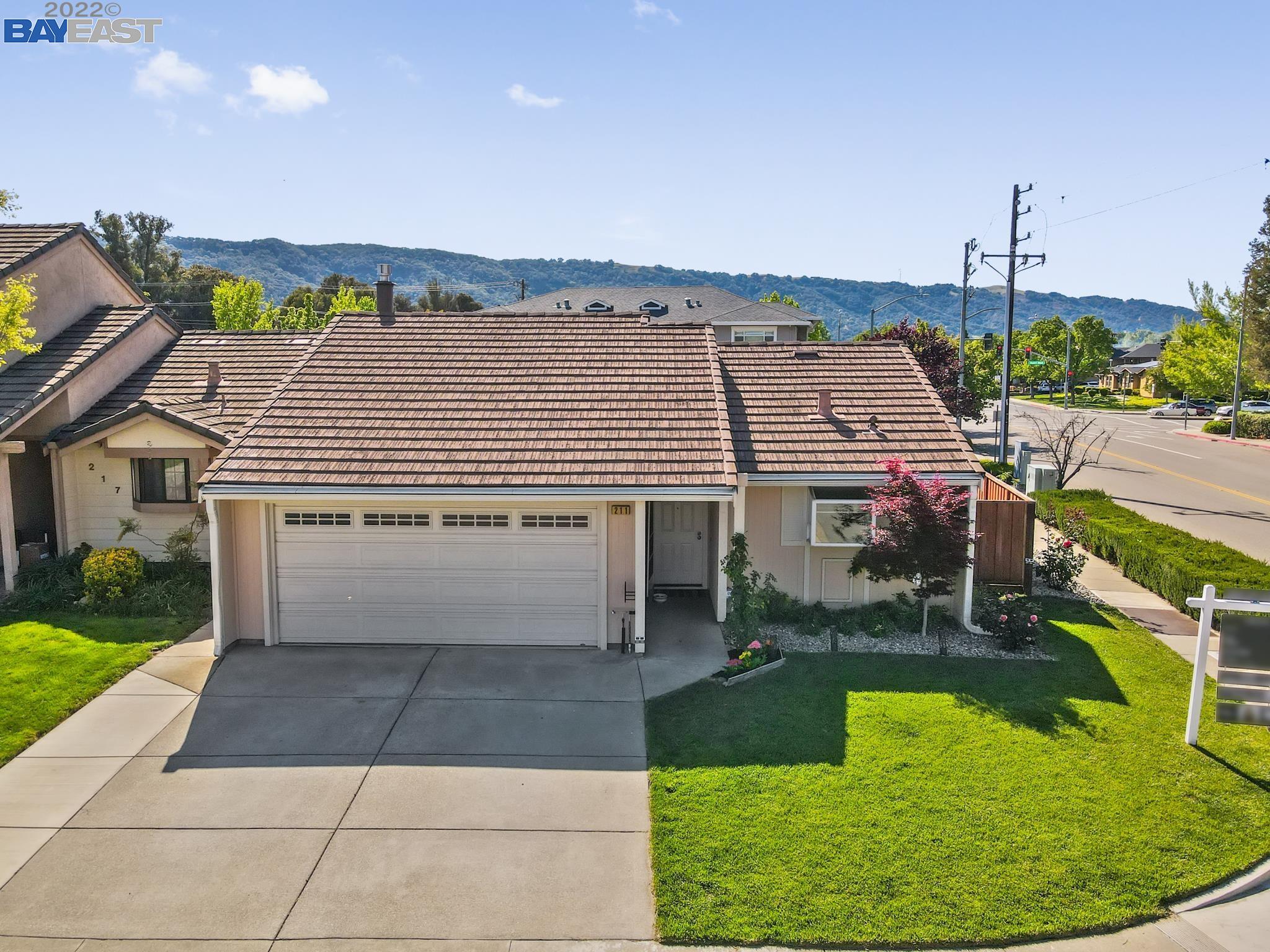211 Tomas Way Pleasanton, CA 94566 - Photo 1 of 1 a view of a terrace with a garden and deck