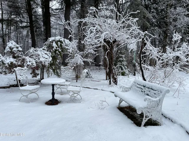 a view of a road with a yard