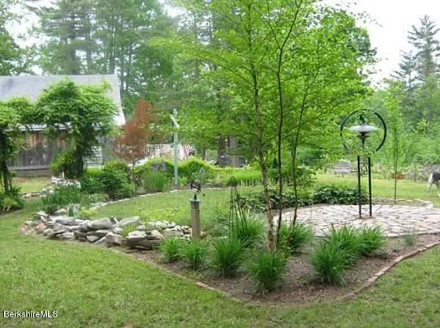 a view of a garden with a patio