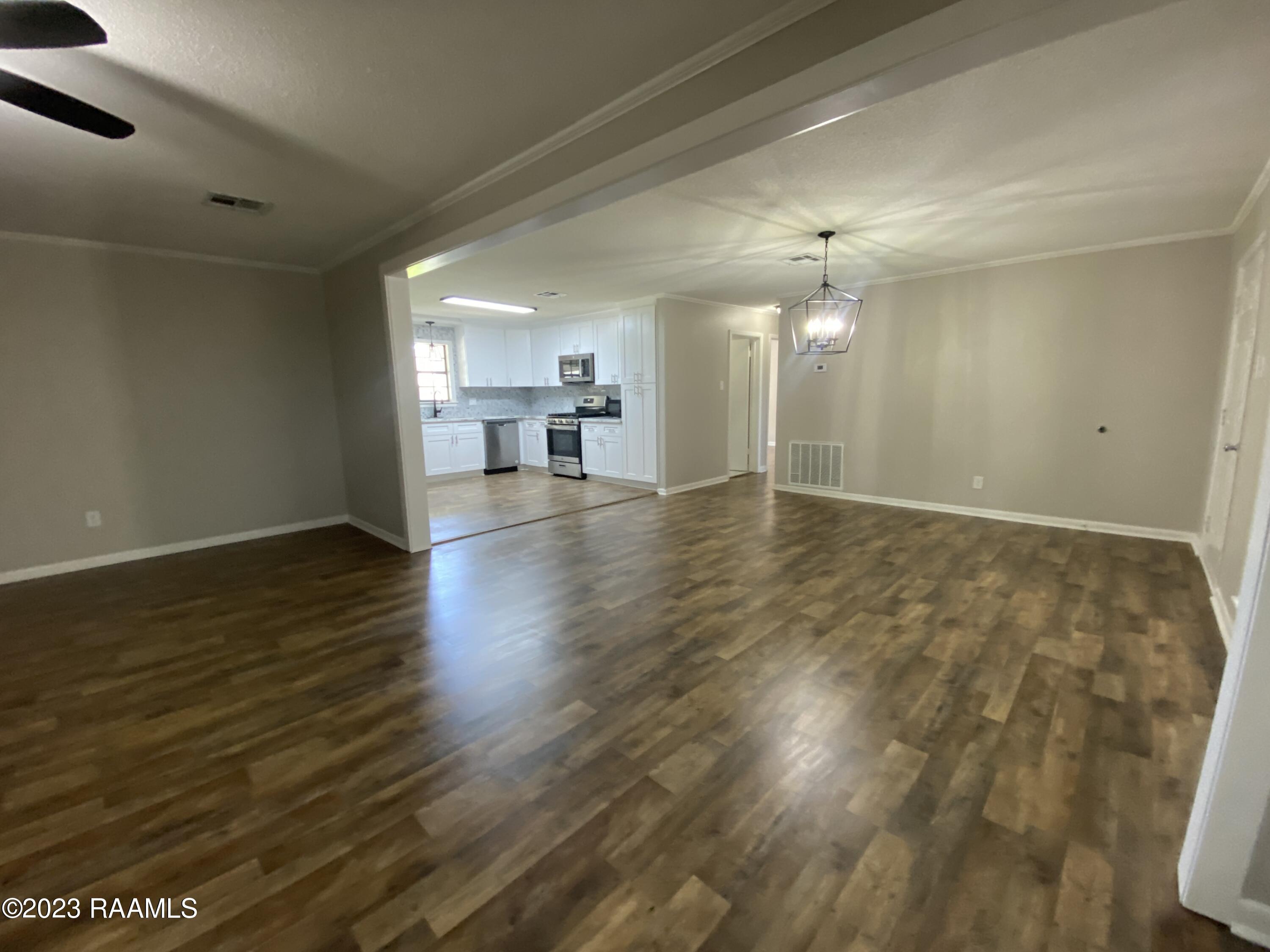 378 Credeur Road Sunset, LA 70584 - Photo 6 of 31 Living Room, Dining and Kitchen
