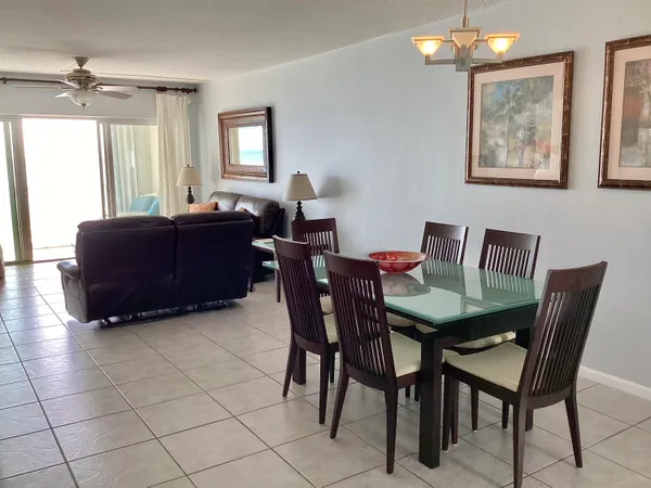 a view of a dining room with furniture