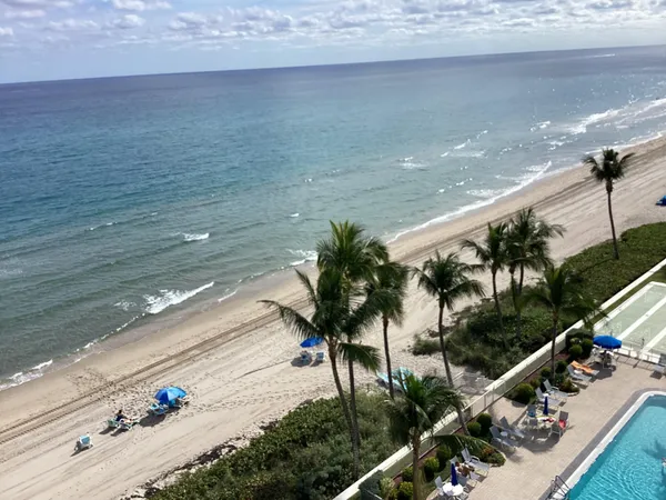 a view of street from balcony