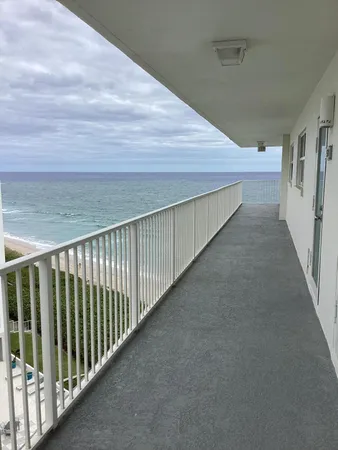 a view of a lake with a terrace
