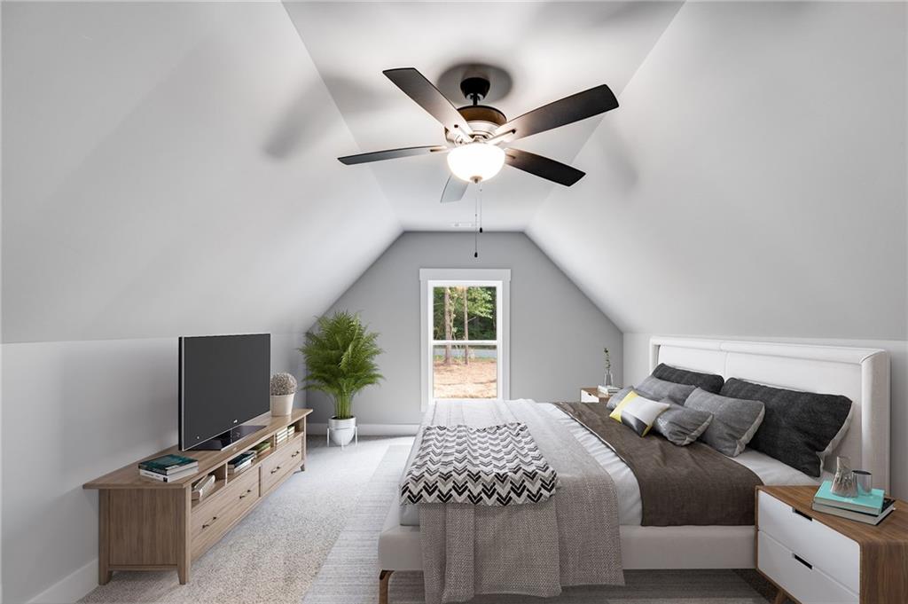 423 Relay Road Silver Creek, GA 30173 - Photo 12 of 48 a bedroom with a bed and a flat screen tv