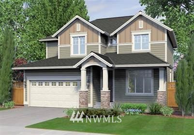 119 197th Street Southwest Bothell, WA 98012 - Photo 1 of 1 a front view of a house with garden