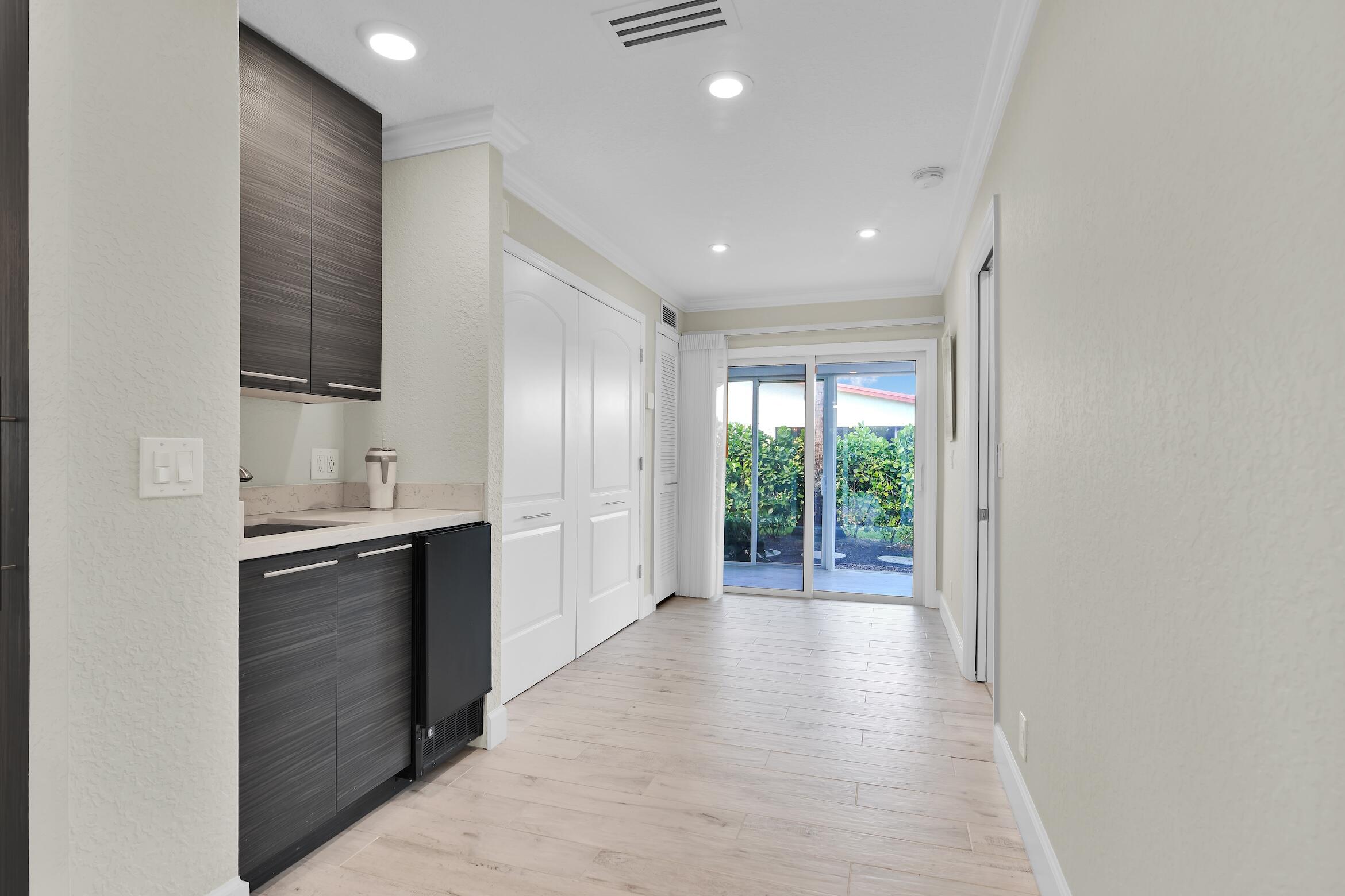 14656 Country Side Lane Delray Beach, FL 33484 - Photo 15 of 40 Wet Bar & Laundry Closet