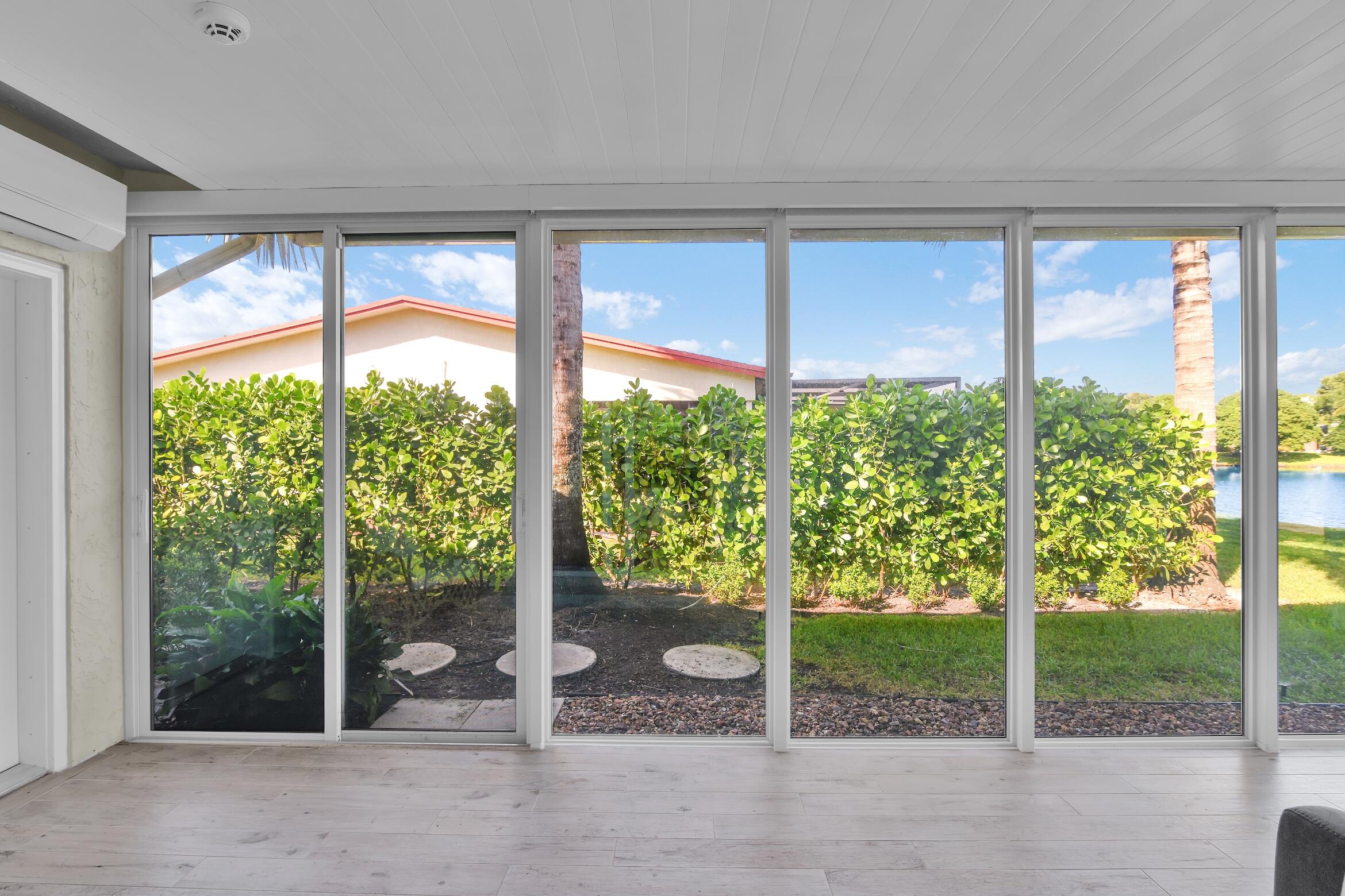 14656 Country Side Lane Delray Beach, FL 33484 - Photo 16 of 40 Glass Enclosed Florida Room