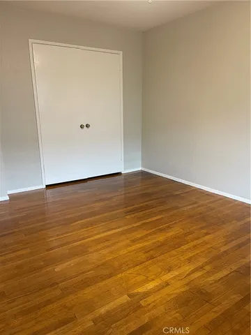 a view of a bathroom with wooden floor