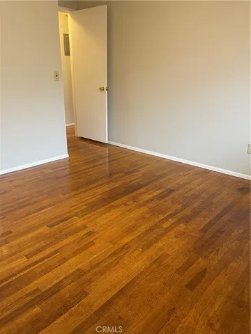 a bath room with a toilet and a bath tub