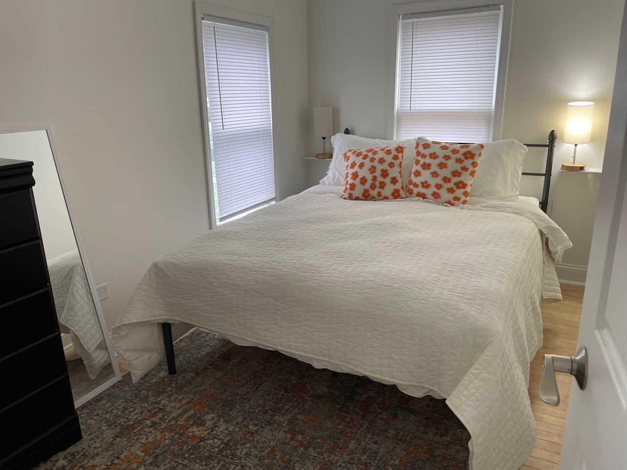 521 Peyton Street, Unit 100 Geneva, IL 60134 - Photo 26 of 34 a bedroom with a bed and a window