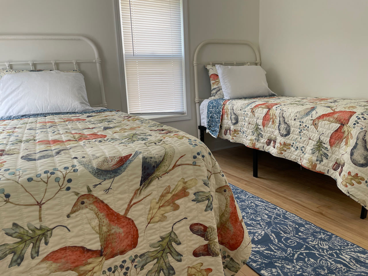 521 Peyton Street, Unit 100 Geneva, IL 60134 - Photo 29 of 34 a bedroom with a bed and a window