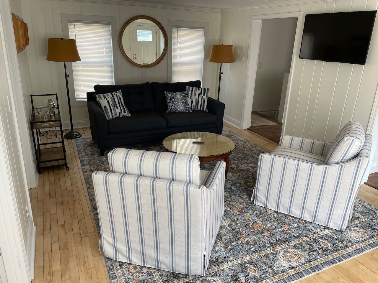 521 Peyton Street, Unit 100 Geneva, IL 60134 - Photo 6 of 34 a living room with furniture and a wooden floor