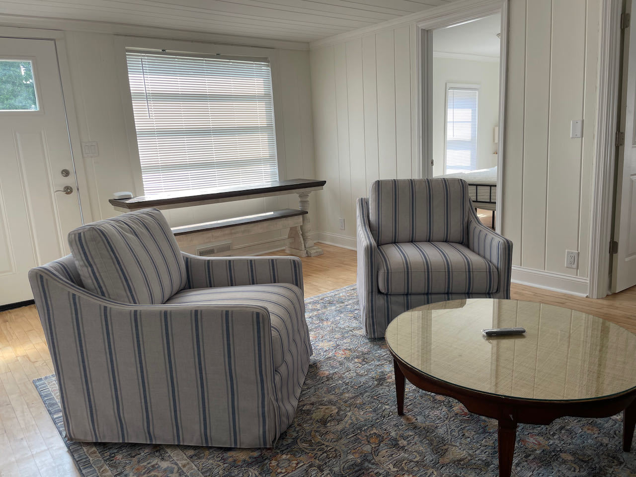 521 Peyton Street, Unit 100 Geneva, IL 60134 - Photo 7 of 34 a living room with furniture and a window