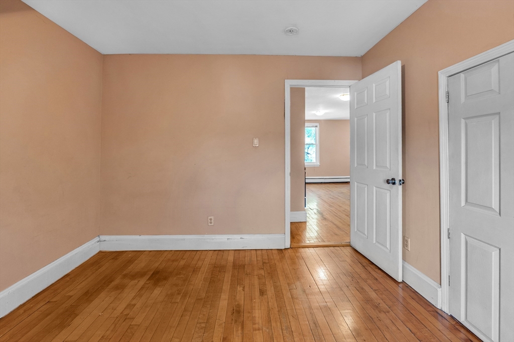 31 Ripley Street, Unit 3 Worcester, MA 01610 - Photo 20 of 29 wooden floor in an empty room
