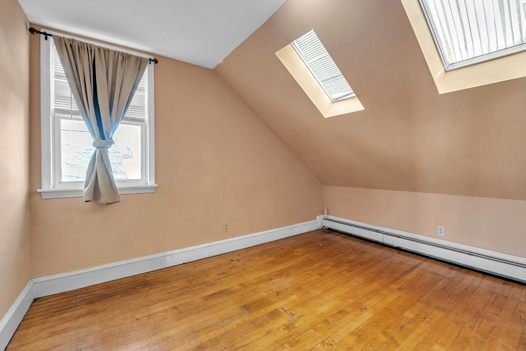 31 Ripley Street, Unit 3 Worcester, MA 01610 - Photo 21 of 29 a view of an empty room with a window