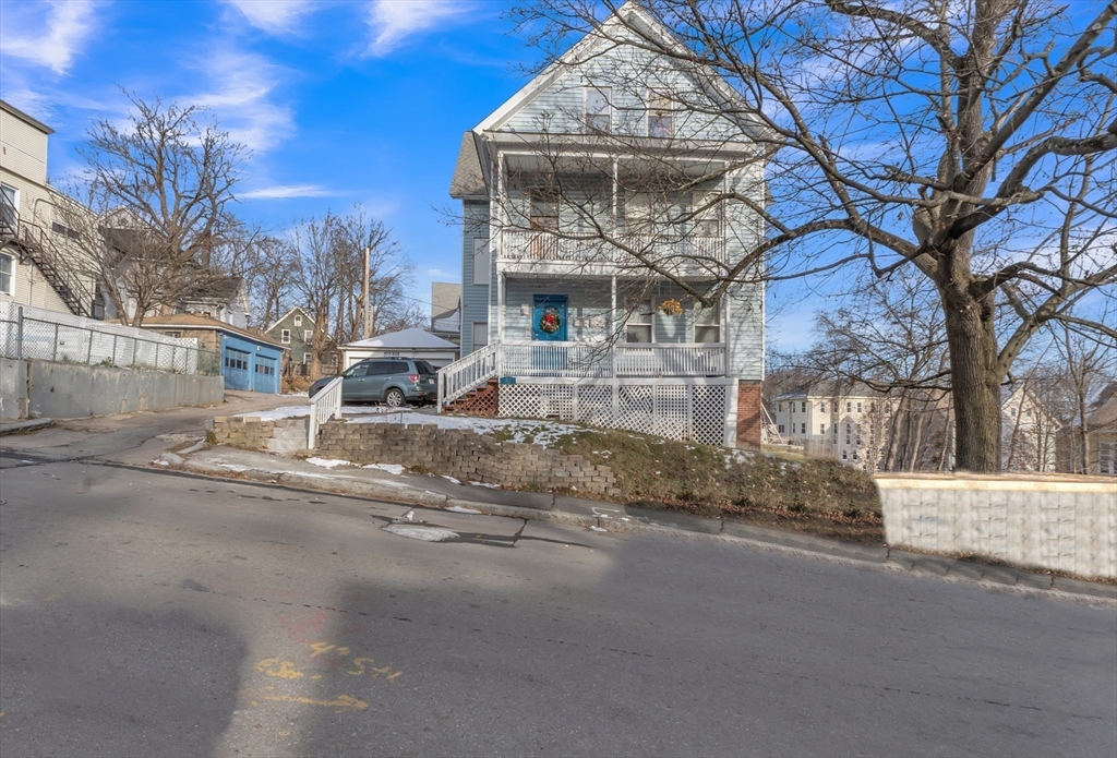 31 Ripley Street, Unit 3 Worcester, MA 01610 - Photo 29 of 29 a front view of a house with a garden