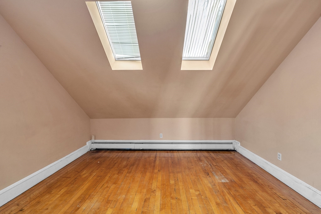 31 Ripley Street, Unit 3 Worcester, MA 01610 - Photo 7 of 29 a view of a room with wooden floor