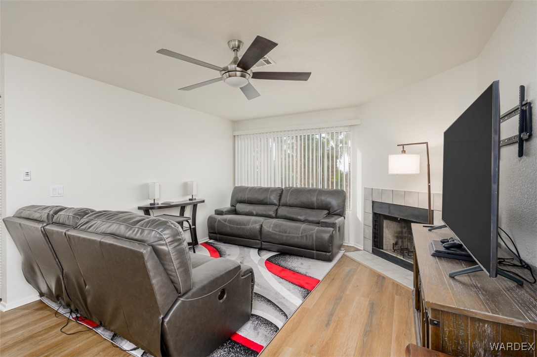2004 Mesquite Lane, Unit 304 Laughlin, NV 89029 - Photo 14 of 36 a living room with furniture and a flat screen tv