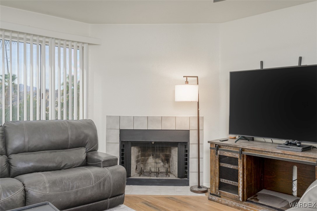 2004 Mesquite Lane, Unit 304 Laughlin, NV 89029 - Photo 15 of 36 a living room with furniture a flat screen tv and a fireplace