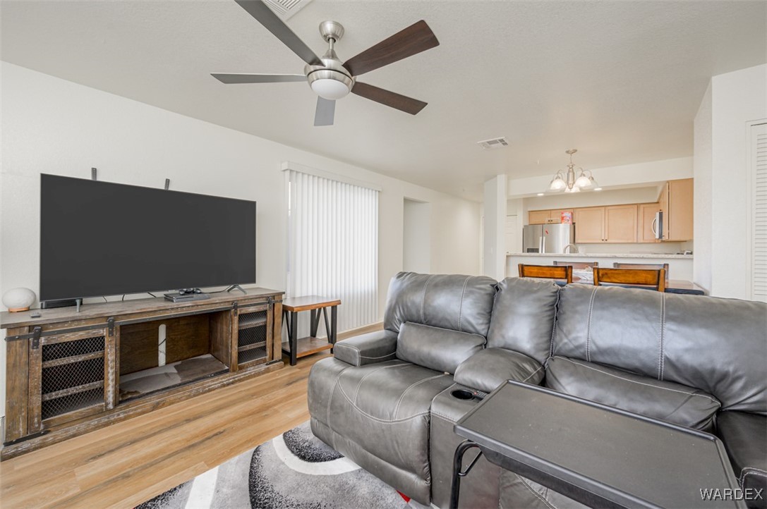 2004 Mesquite Lane, Unit 304 Laughlin, NV 89029 - Photo 18 of 36 a living room with furniture and a flat screen tv