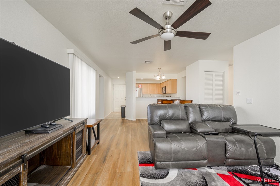 2004 Mesquite Lane, Unit 304 Laughlin, NV 89029 - Photo 19 of 36 a living room with furniture and a flat screen tv