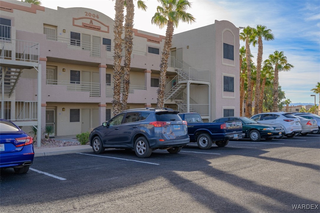 2004 Mesquite Lane, Unit 304 Laughlin, NV 89029 - Photo 2 of 36 a view of a cars parked in front of a building