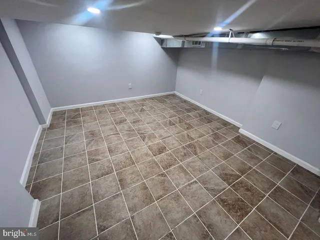 a utility room with a sink a washer and dryer