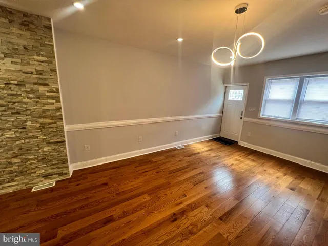 a view of livingroom with hardwood floor and window